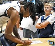 Basketball Showdown: Visual Moments from the Coastal Classic Tip-Off - North Florida vs. Presbyterian College Clash