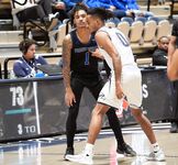 Basketball Showdown: Visual Moments from the Coastal Classic Tip-Off - North Florida vs. Presbyterian College Clash