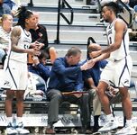 Basketball Showdown: Visual Moments from the Coastal Classic Tip-Off - North Florida vs. Presbyterian College Clash