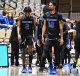 Basketball Showdown: Visual Moments from the Coastal Classic Tip-Off - North Florida vs. Presbyterian College Clash