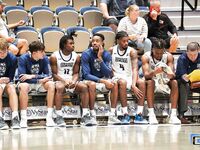 Basketball Showdown: Visual Moments from the Coastal Classic Tip-Off - North Florida vs. Presbyterian College Clash