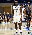 Basketball Showdown: Visual Moments from the Coastal Classic Tip-Off - North Florida vs. Presbyterian College Clash