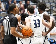 Basketball Showdown: Visual Moments from the Coastal Classic Tip-Off - North Florida vs. Presbyterian College Clash