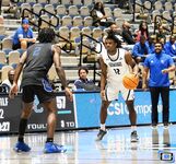 Basketball Showdown: Visual Moments from the Coastal Classic Tip-Off - North Florida vs. Presbyterian College Clash