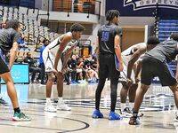 Basketball Showdown: Visual Moments from the Coastal Classic Tip-Off - North Florida vs. Presbyterian College Clash