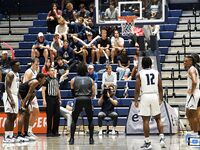 Basketball Showdown: Visual Moments from the Coastal Classic Tip-Off - North Florida vs. Presbyterian College Clash