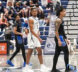 Basketball Showdown: Visual Moments from the Coastal Classic Tip-Off - North Florida vs. Presbyterian College Clash