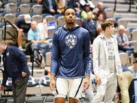 Basketball Showdown: Visual Moments from the Coastal Classic Tip-Off - North Florida vs. Presbyterian College Clash