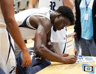 Basketball Showdown: Visual Moments from the Coastal Classic Tip-Off - North Florida vs. Presbyterian College Clash