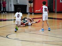 Sagemont Elementary Triumphs Over Summit Quest in Basketball Showdown