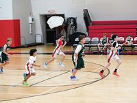 Sagemont Elementary Triumphs Over Summit Quest in Basketball Showdown