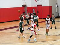 Sagemont Elementary Triumphs Over Summit Quest in Basketball Showdown