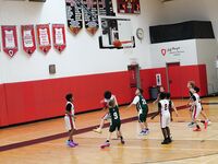 Sagemont Elementary Triumphs Over Summit Quest in Basketball Showdown