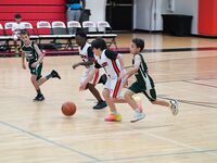 Sagemont Elementary Triumphs Over Summit Quest in Basketball Showdown