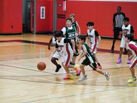 Sagemont Elementary Triumphs Over Summit Quest in Basketball Showdown