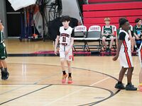 Sagemont Elementary Triumphs Over Summit Quest in Basketball Showdown